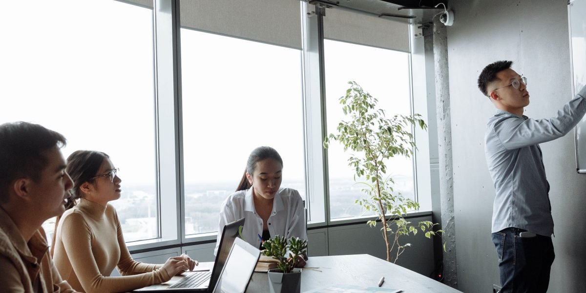 A dedicated leader inspiring their team to embrace new ideas and drive technological innovation within a health organization.