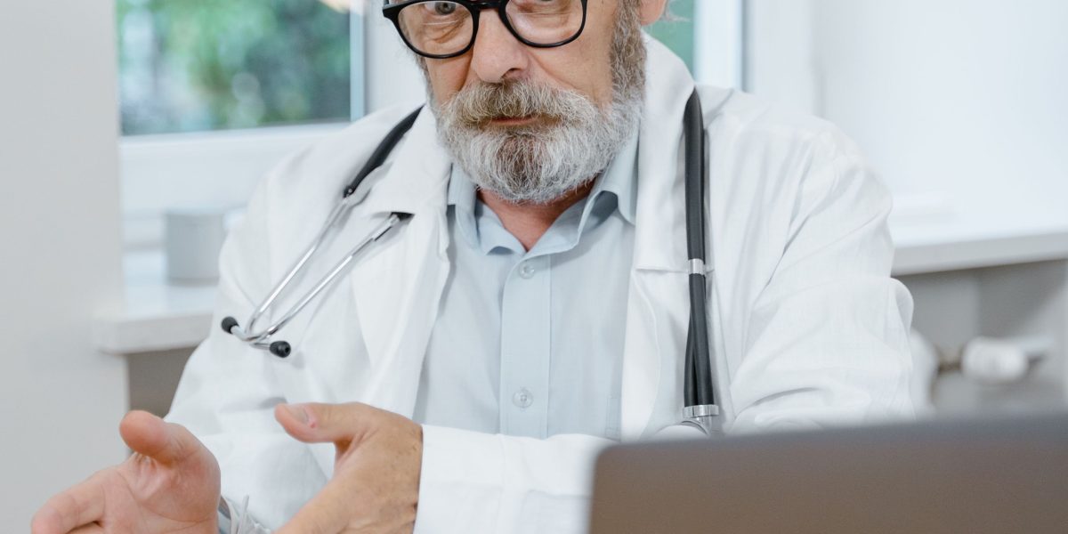 A compassionate doctor engaging directly with a patient, demonstrating improved patient interaction facilitated by digital tools.