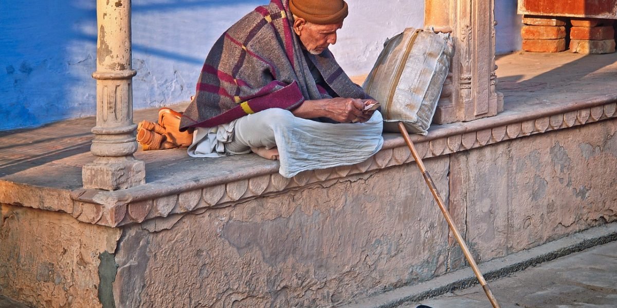 A senior person confidently reviews their health plan details on a tablet, showcasing the impact of well-designed digital experiences.
