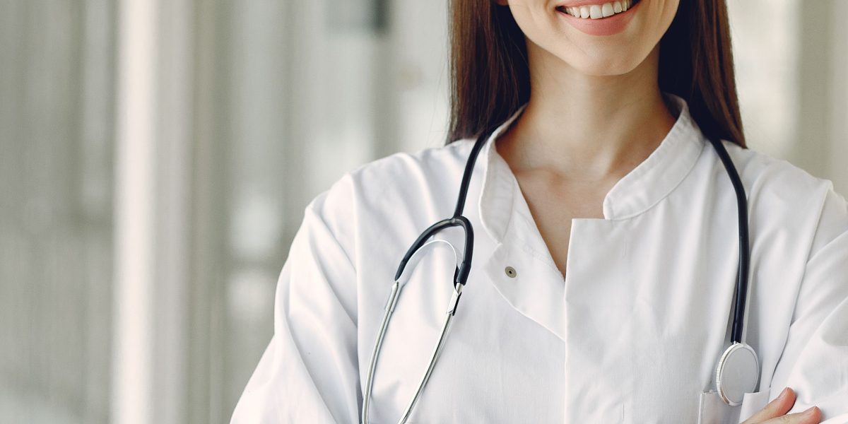 A confident medical professional, symbolizing the positive long-term impact and successful growth of healthcare initiatives.
