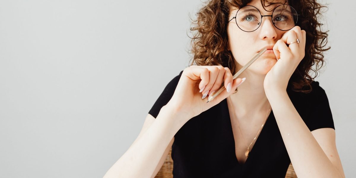 Professionals carefully considering various health benefits options to find the best fit for their organization.