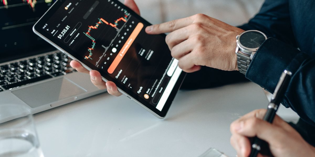 An individual confidently reviewing their health savings account or health plan choices on a digital device.