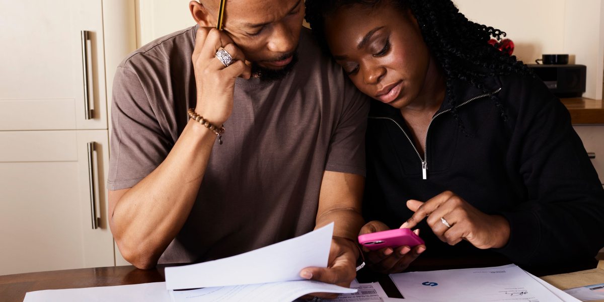 A family uses digital tools to plan their healthcare finances together.