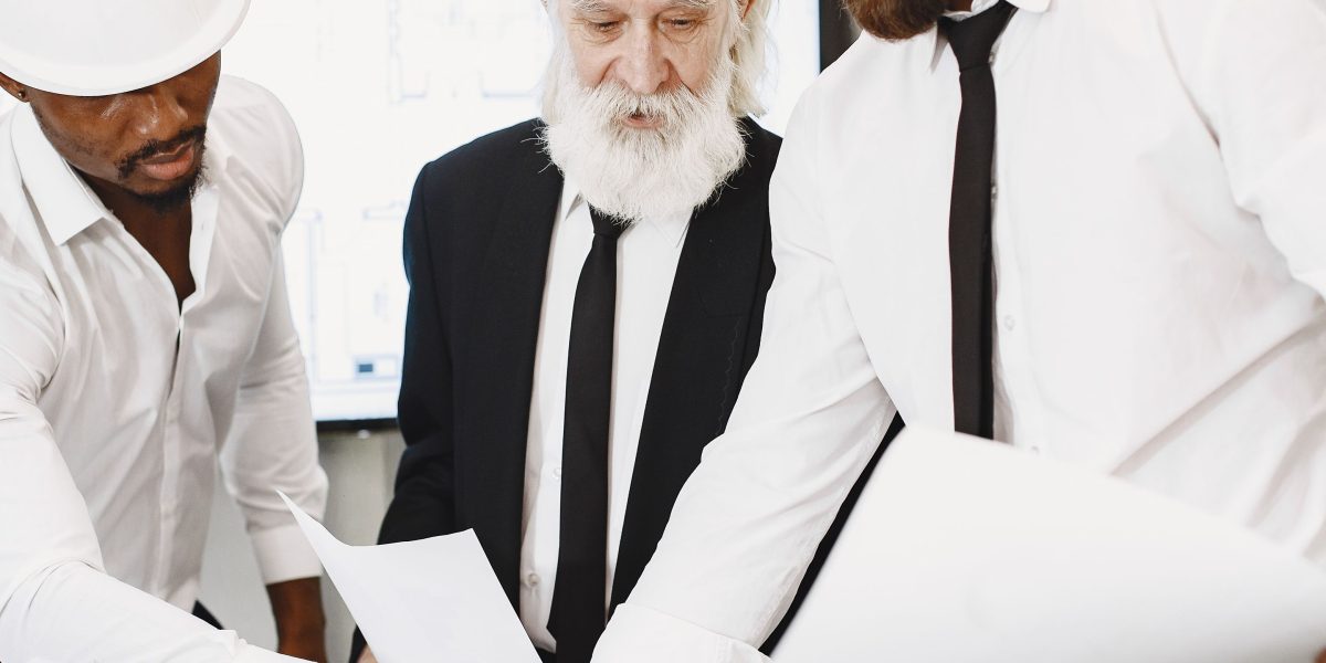 Legal and IT professionals review healthcare technology compliance and security protocols.