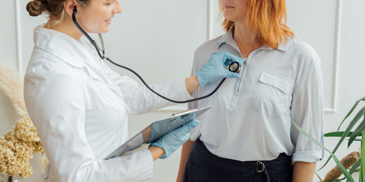 A doctor consulting with a patient, highlighting the importance of accessible provider networks for quality care.