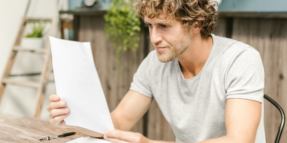A focused professional diligently evaluates potential digital health solutions and their alignment with patient needs.