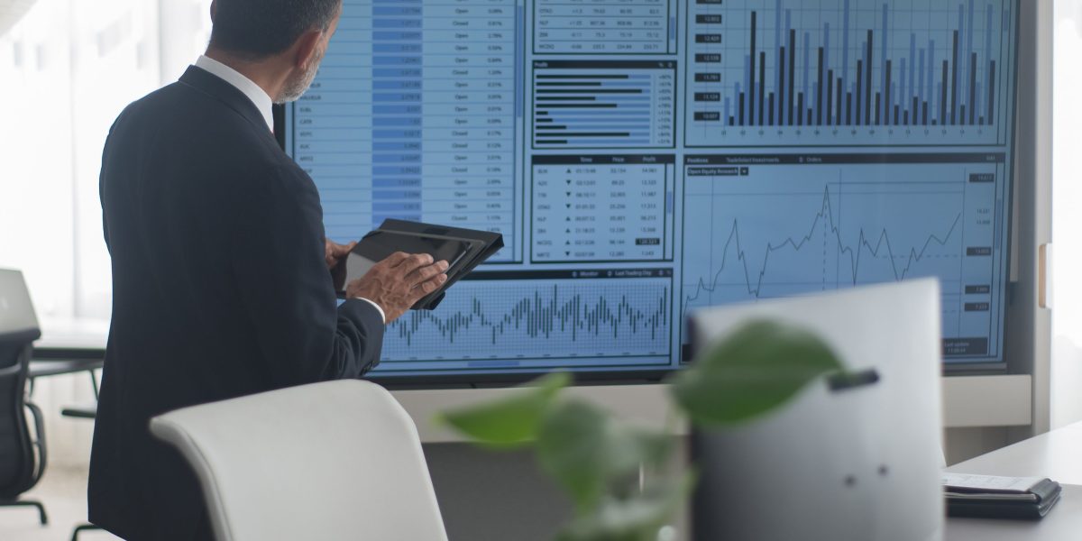 Technology and healthcare professionals collaborating to integrate new digital systems seamlessly into existing clinical workflows.
