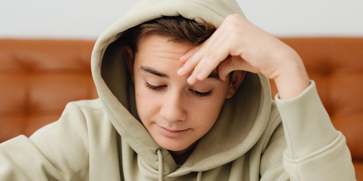 A dedicated student immersed in studying, highlighting the rigorous preparation required for medical school exams.
