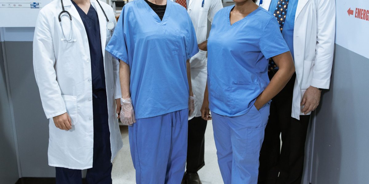 A diverse team of healthcare professionals collaborating to provide comprehensive patient care.