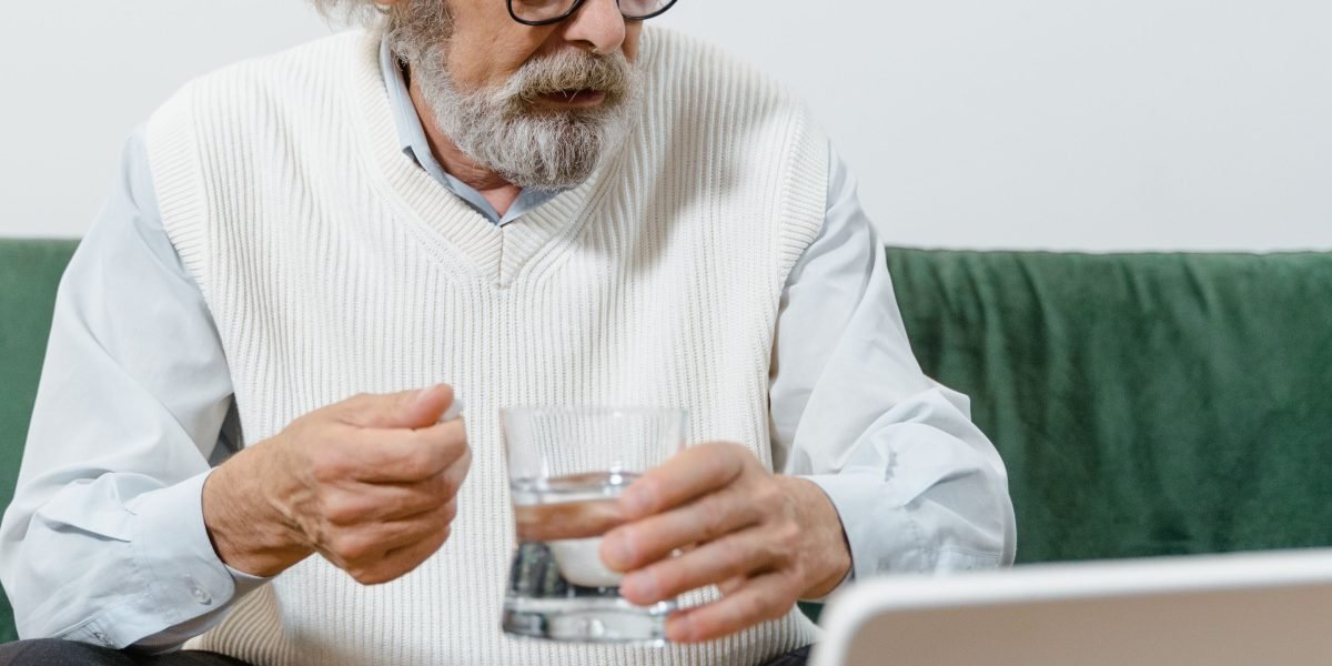 A person engaging in a telehealth video call, accessing medical advice conveniently from home.