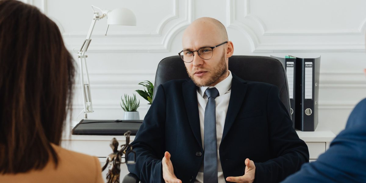 An individual consults with an advisor, discussing important personal decisions.