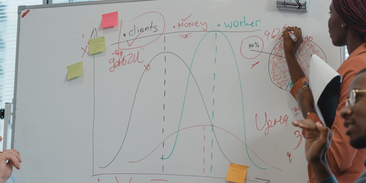 A group of professionals discussing complex health technology strategies, reflecting decision-making.