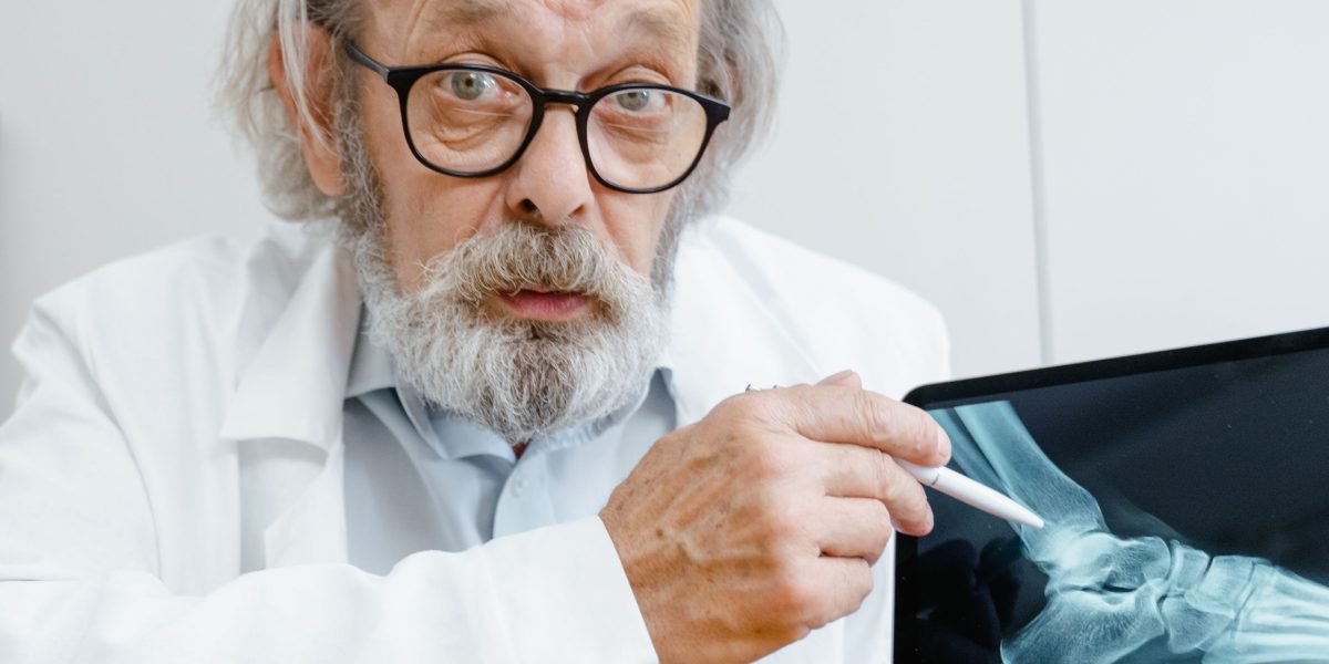 A doctor confidently reviewing patient data, reflecting enhanced clinical confidence with AI support.